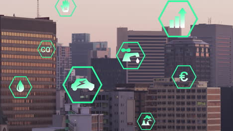 animation of network of eco icons over cityscape