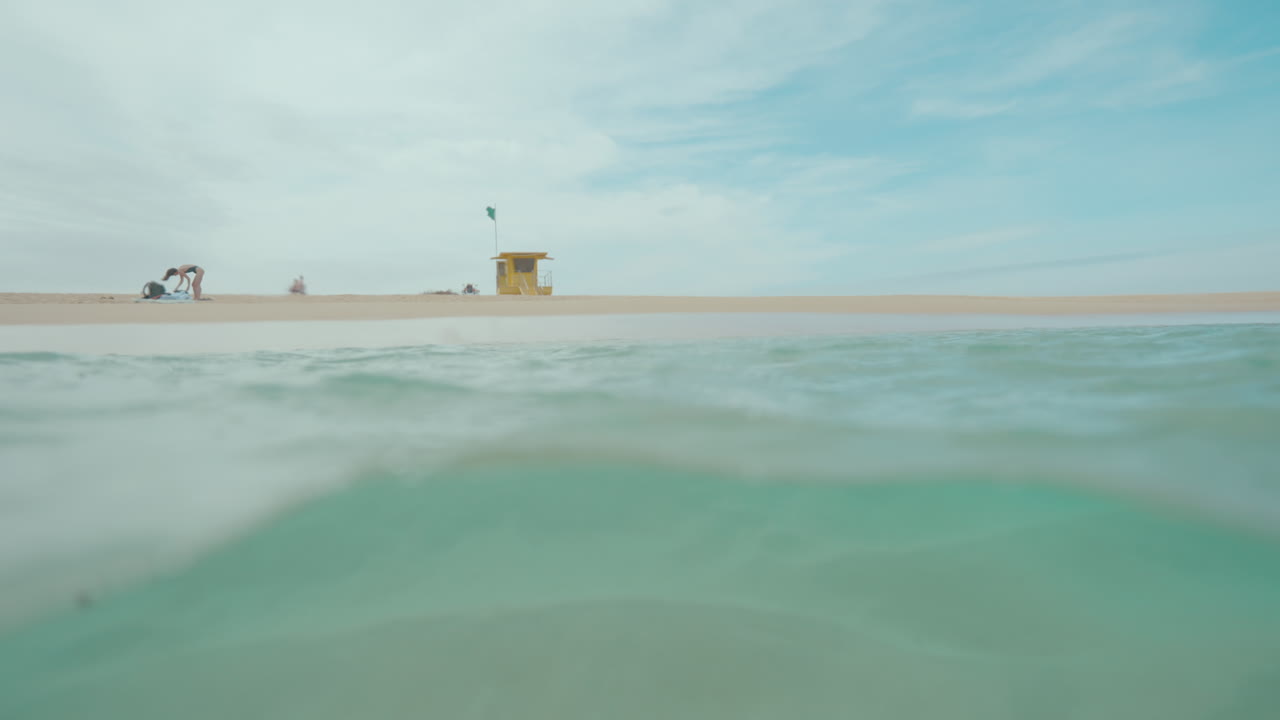 Tranquil Beach Scene with Lifeguard Stand