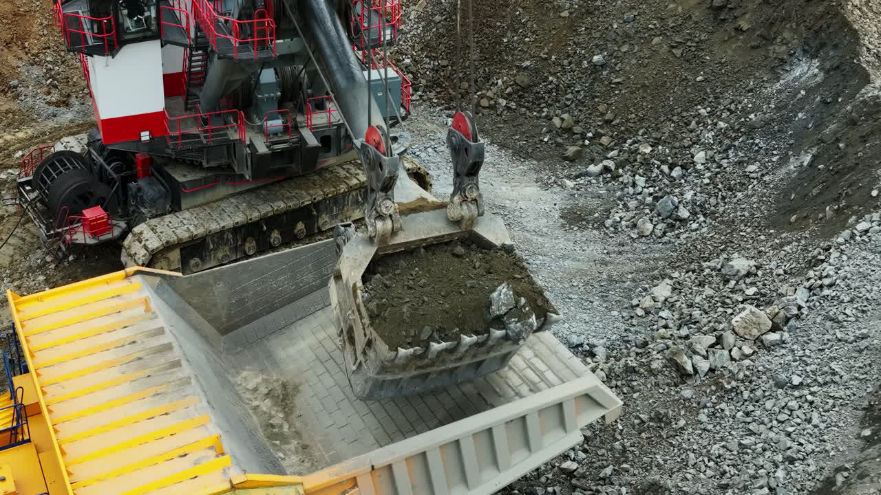 Mining operation with excavator and dump truck