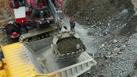 mining operation with excavator and dump truck