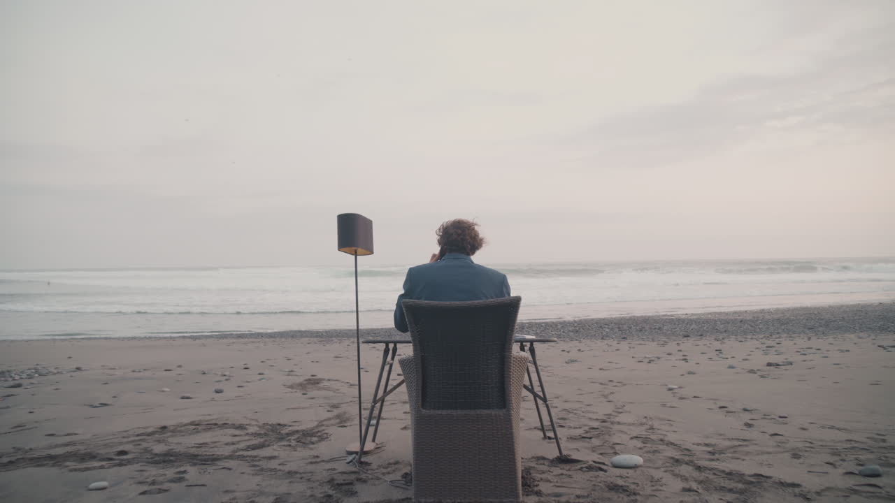 Businessman At Work In Tropics