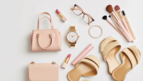 collection of women's fashion and beauty accessories flat lay