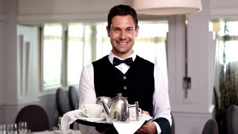 waiter showing a tea tray