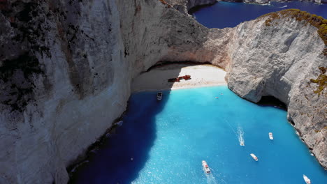 Aerial:-Landscape-view-of-famous-Navagio-beach-in-Zakynthos,-Greece