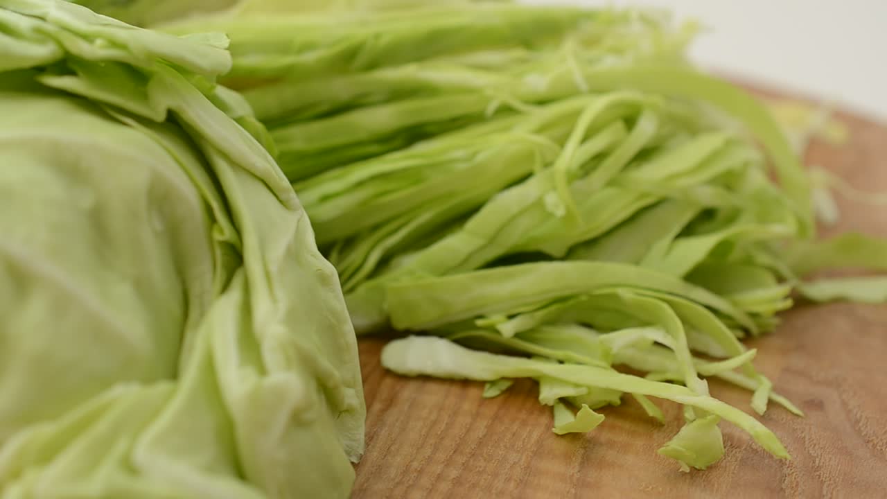 Cabbage on a board. Shooting in the movement