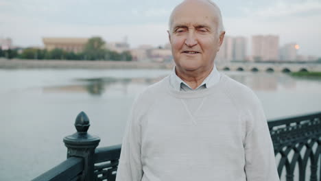 elderly man by the river