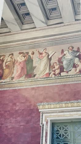 vibrant classical murals on the national and kapodistrian university building