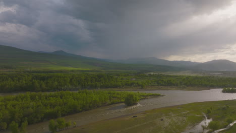 panning shot of a river splitting into smaller streams