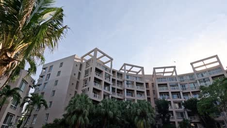 time-lapse of a residential building from day to dusk.