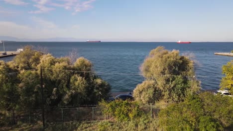 4k drone clip ascending over a basketball court in a sports complex in thessaloniki, greece