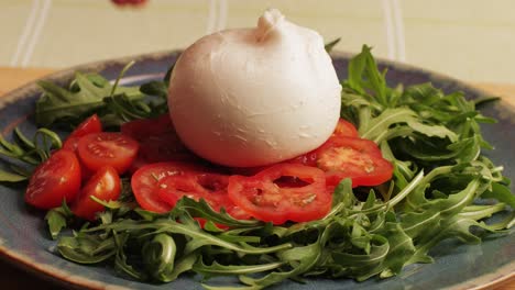 burrata salad with cherry tomatoes and arugula