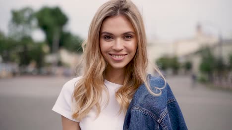 Portrait-Of-A-Happy-Young-Woman-Walking-Towards-The-Camera