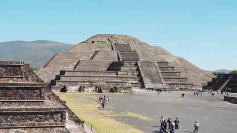 tourists visiting aztec teotihuacan pyramids, mexico city