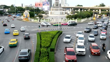 traffic at victory monument in bangkok, thailand.