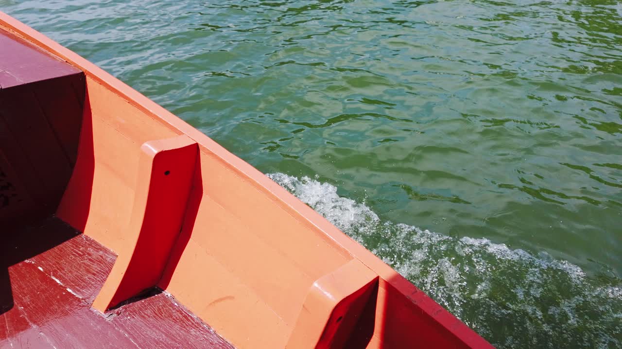 Water Ripples and ocean waves during boat ride at day