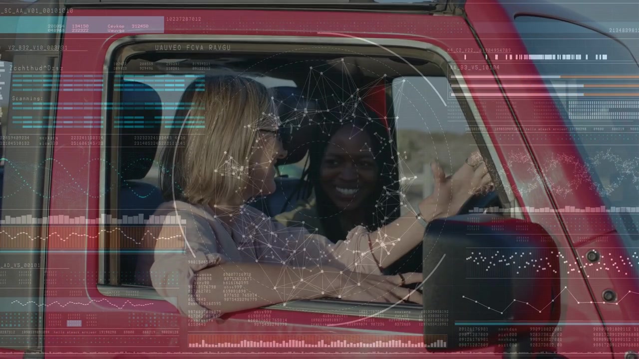 HUD appearing, driver turning to friend and laughing, high-fiving near steering wheel, showing tech