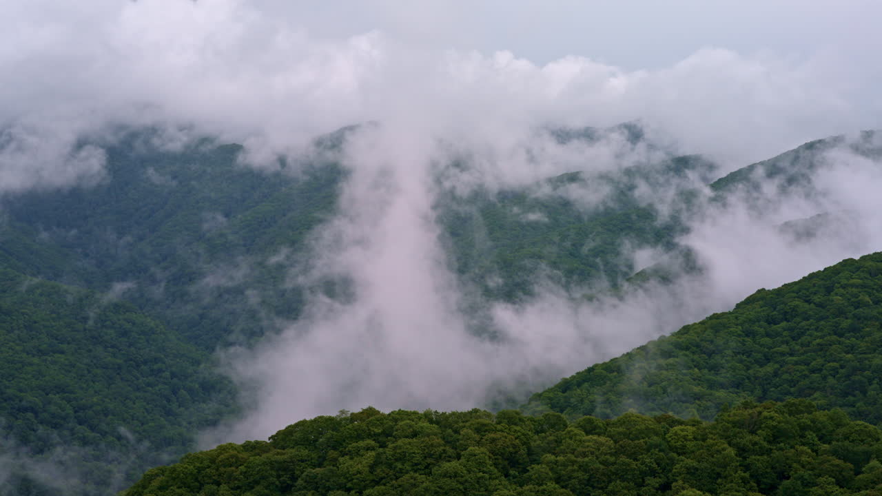 Haunting aerial look at fog and mist rolling over the Smokies