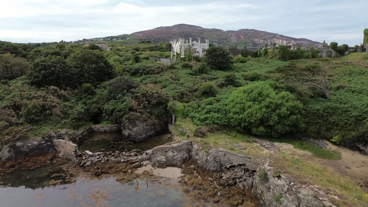 Drone clip of abandoned Welsh castle building - Soldier's Point Hotel, Anglesey, North Wales