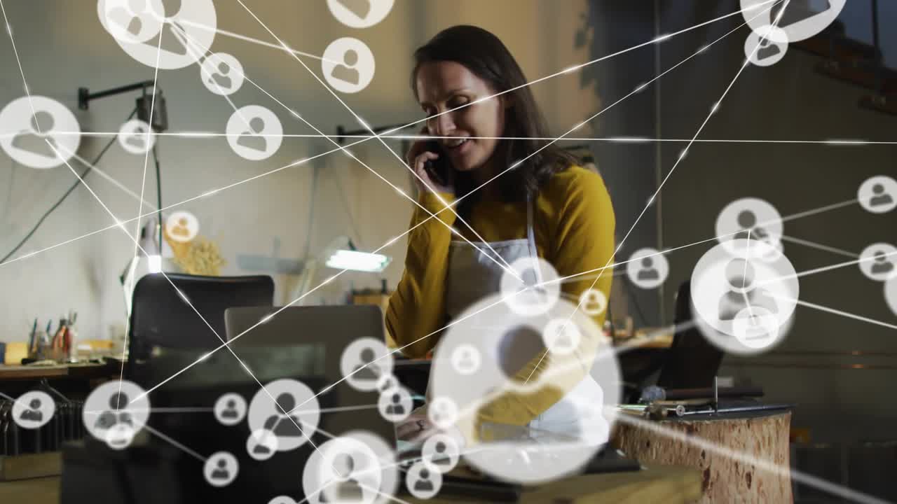 Woman calling, typing on laptop in craft studio, call starting expanding network overlay for sales