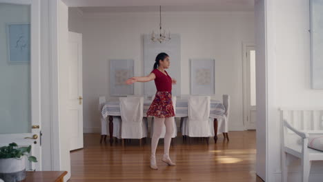 happy teenage ballerina girl dancing practicing ballet dance moves rehearsing at home 4k