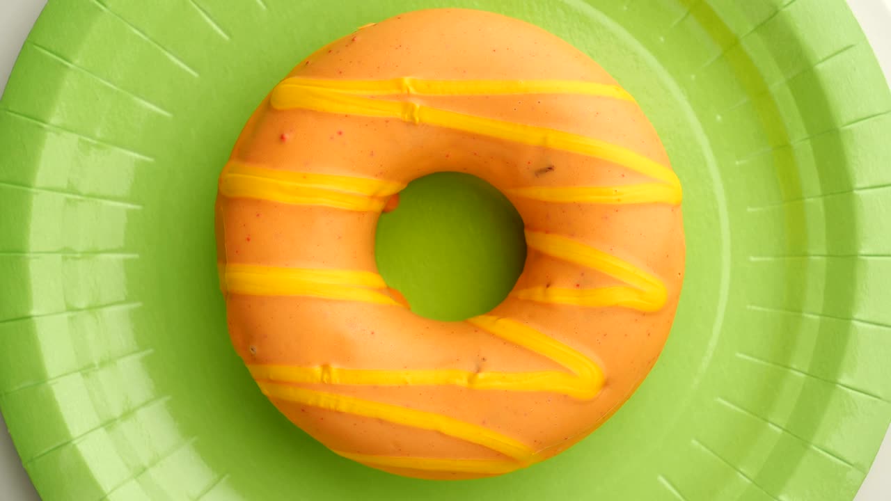 el donut está vidriado de cerca, con un bucle sin costuras.