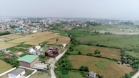 aerial views of rural indian landscape: farmland, villages, and infrastructure