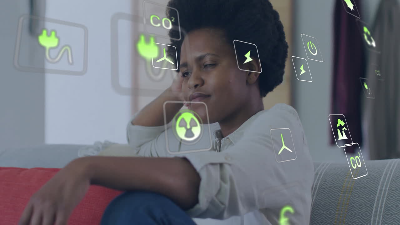 animación de iconos de ecología sobre feliz mujer afroamericana relajándose en casa
