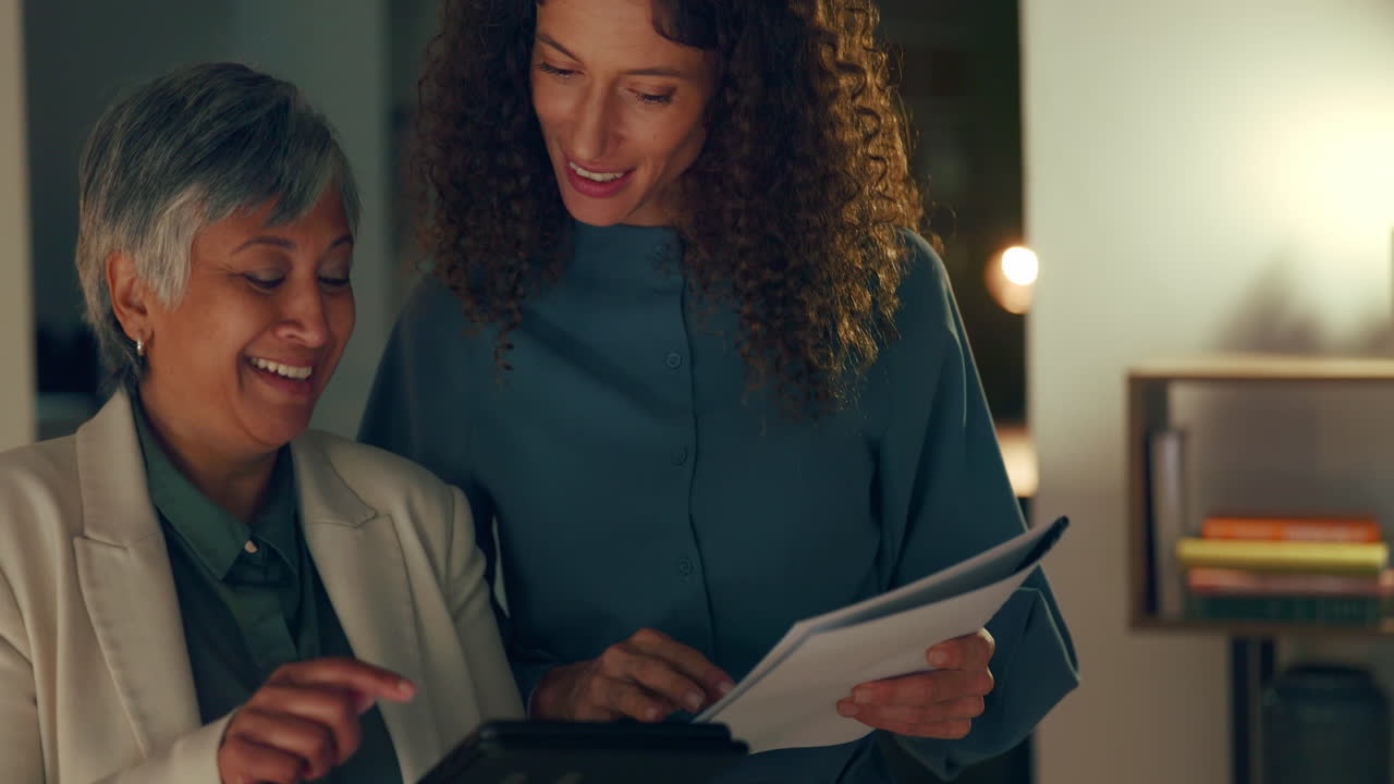 Business women, tablet and documents in night