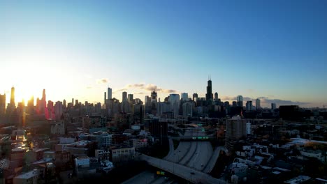 morning sunrise over city of chicago skyline aerial timelapse