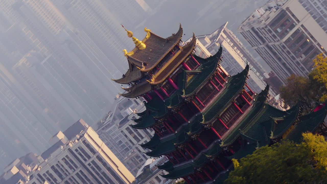 Hong'en Pavilion Against High-rise City In Chongqing, China. Aerial Close-up Rotate Shot