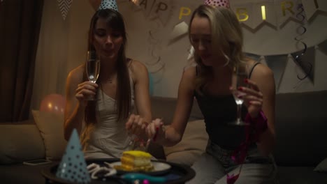 two women celebrating a birthday party