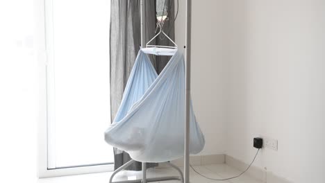 baby sleeping in electronic cradle