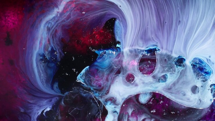 Soft light blue and pink alcohol inks swirling together in a macro studio shot. Ethereal and dreamy atmosphere with high-contrast fluid dynamics.