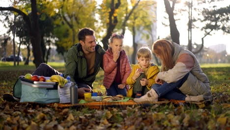 family picnic in the autumn park