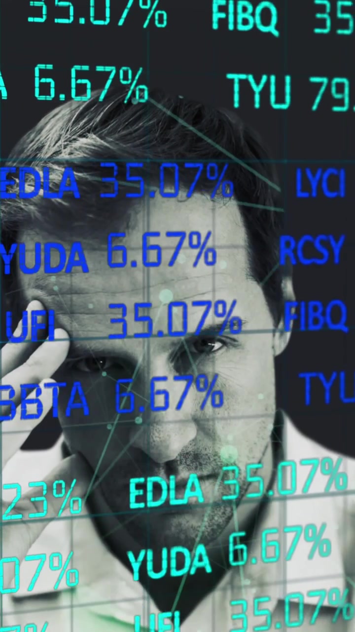 Stock market data processing against man with hand on his head