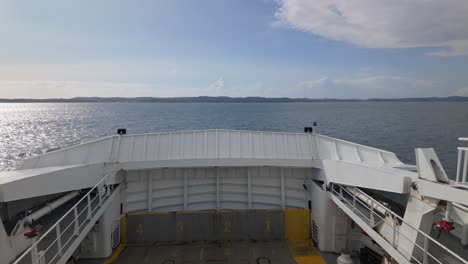 large ferryboat ship bow sailing over bomlafjorden in vestland county, norway. wide pov shot