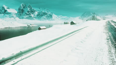 traditional norwegian wooden houses under the fresh snow