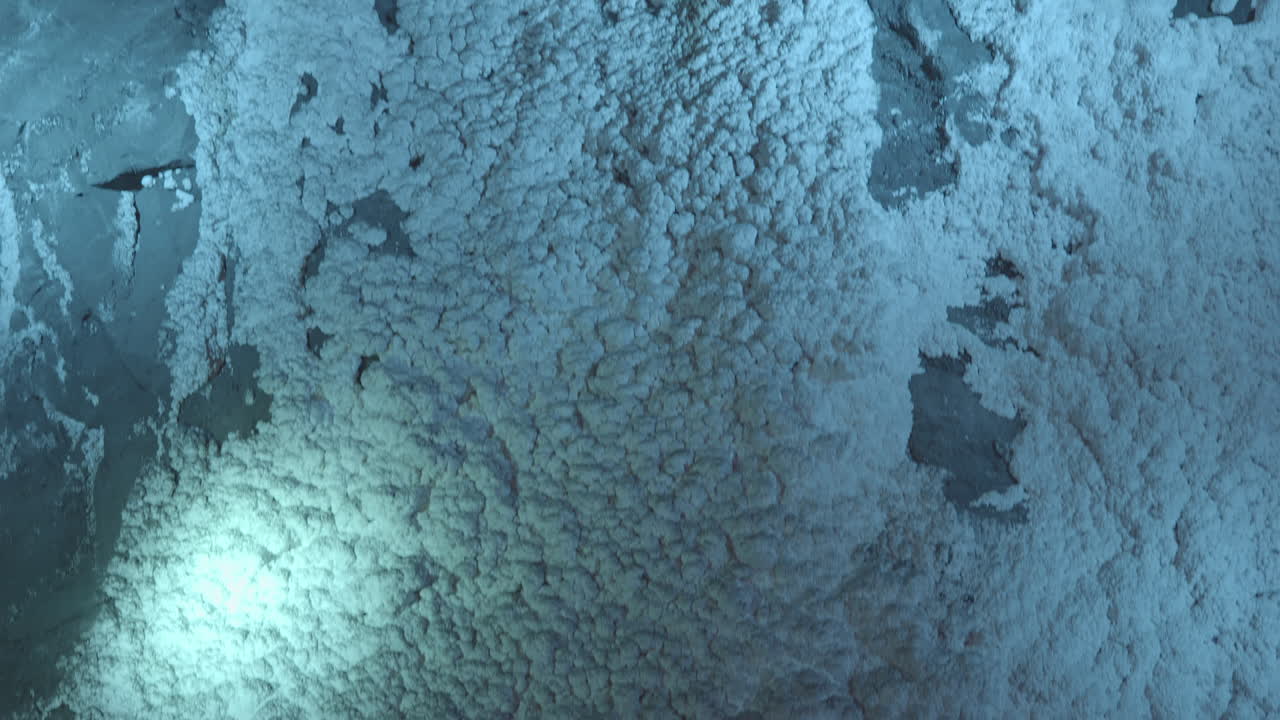 slowmotion revealing shot of a salt tunnel within an abandoned salt mine