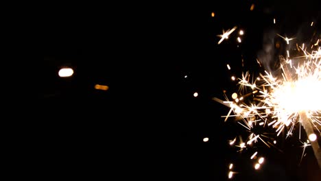 bengal fire. new year sparkler candle on a black background. holiday party concept