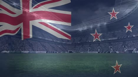 Animation-of-waving-new-zealand-flag-against-view-of-a-sports-stadium