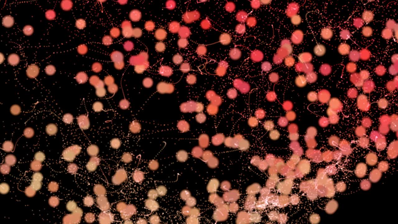 추상적으로 노란색 오렌지색의 떠다니는 빛 입자입니다.