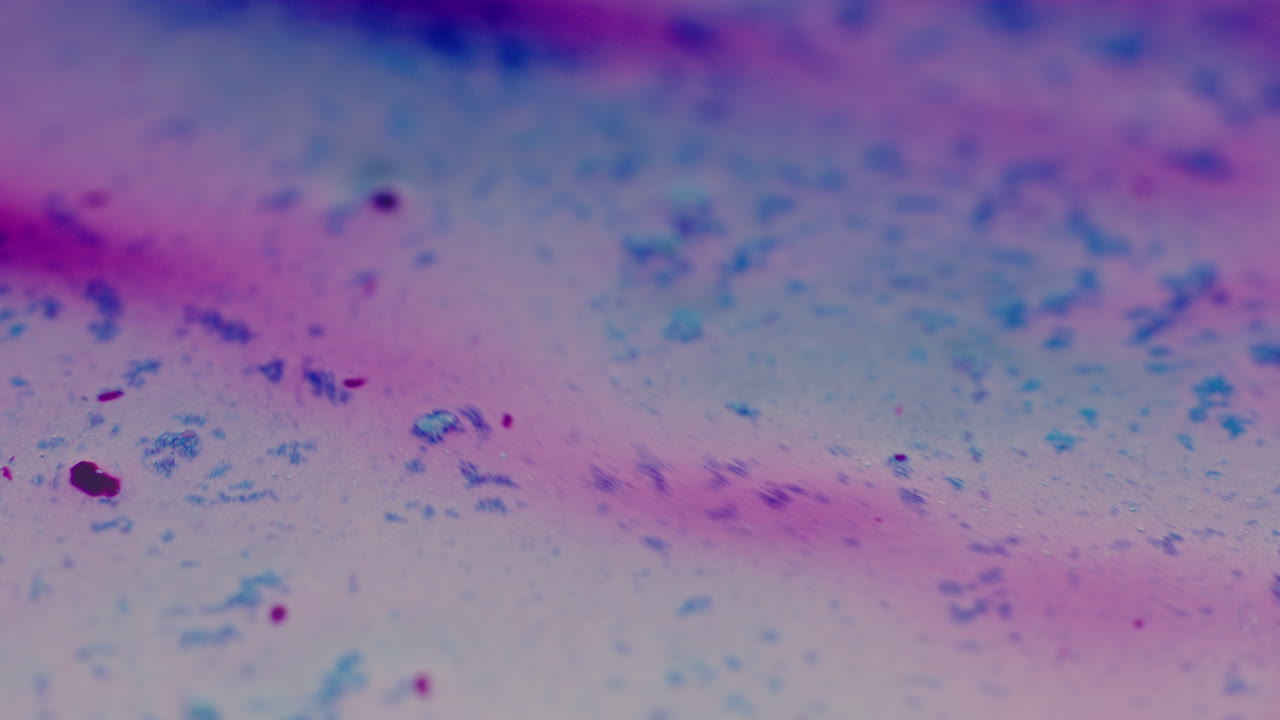 Colourful, organic, liquids macro shots buzzing and flowing