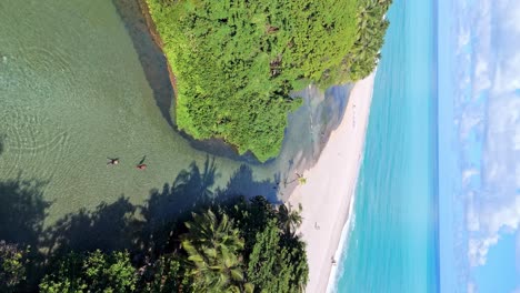 fotografía vertical de las playas turísticas y el río en los patos, barahona, república dominicana