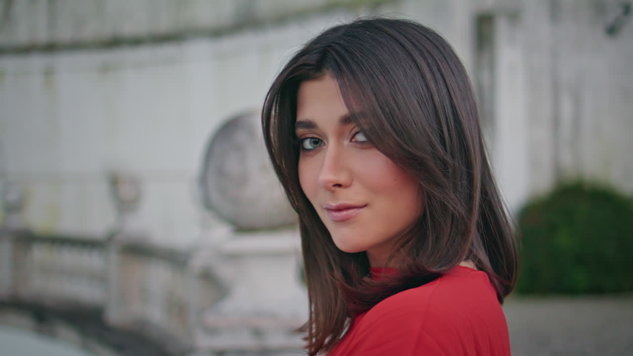 Tranquil girl enjoy evening city weekend closeup. Smiling woman looking camera