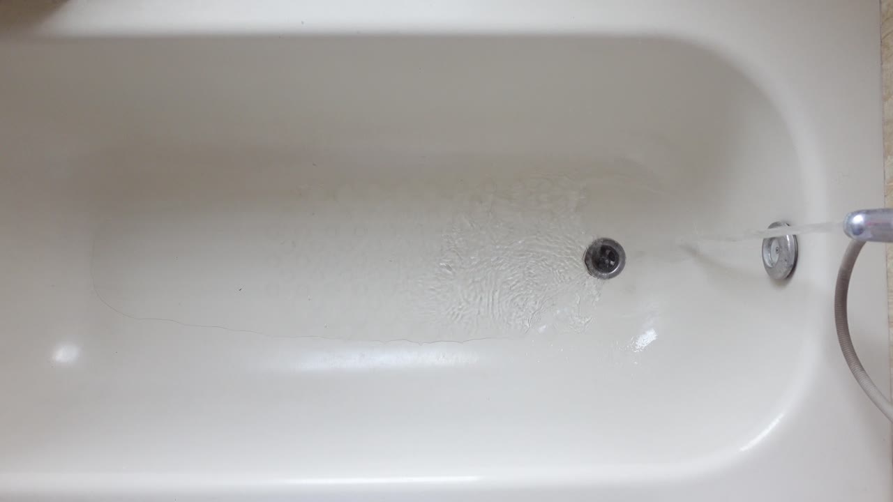 Bathtub with water running