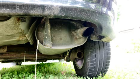 exhaust fumes coming out of the car's exhaust pipe, slow motion video