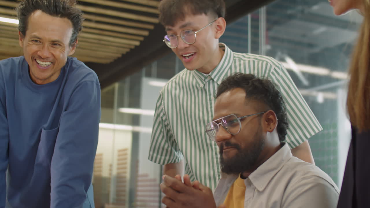 Business Team Discussing Successful Project in Office