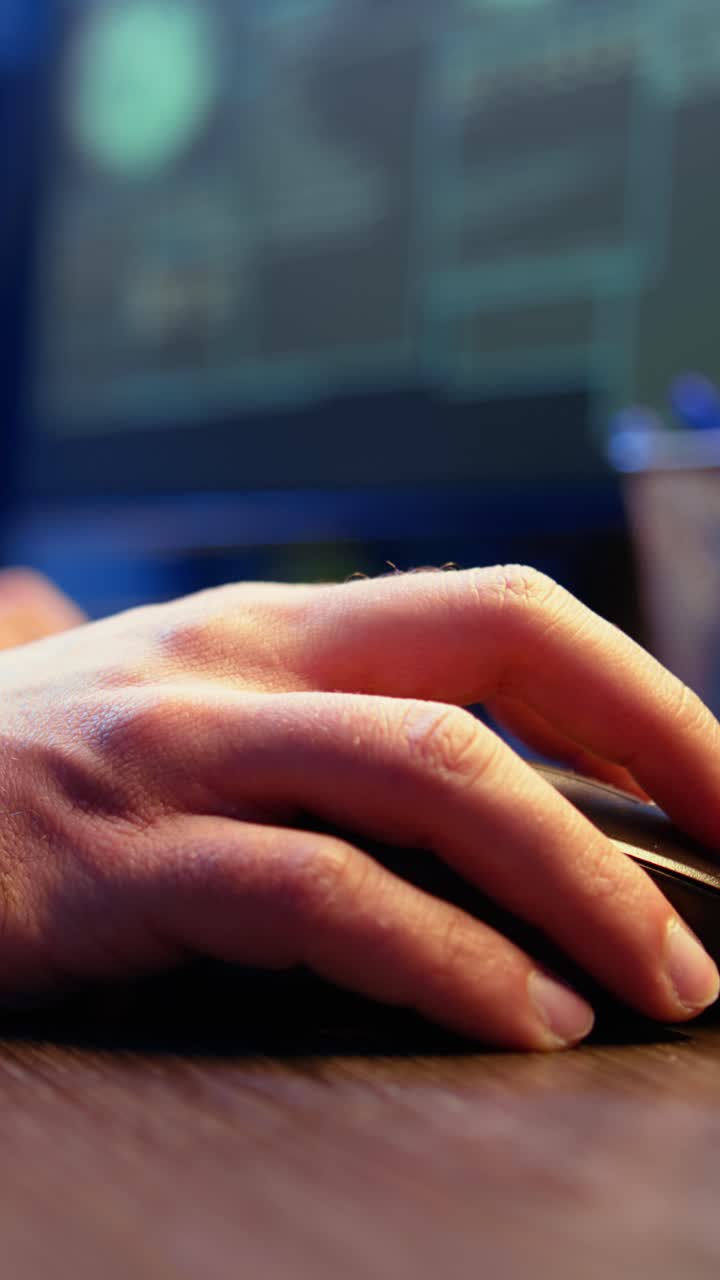 Vertical video Meticulous hacker typing on computer keyboard, close up