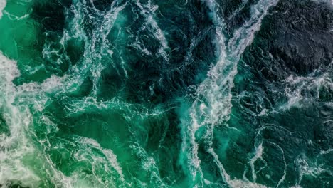 waves of water of the river and the sea meet each other during high tide and low tide.