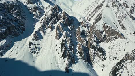 Arctic mountainous summit, idyllic extreme alpine terrain, aerial view